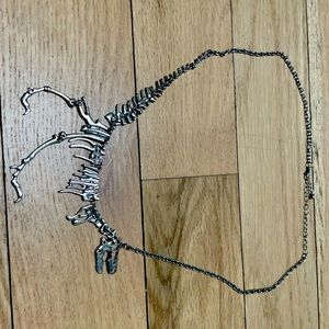 Dinosaur bones necklace.
